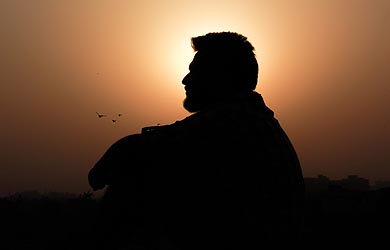 Silhouette of man at sunset